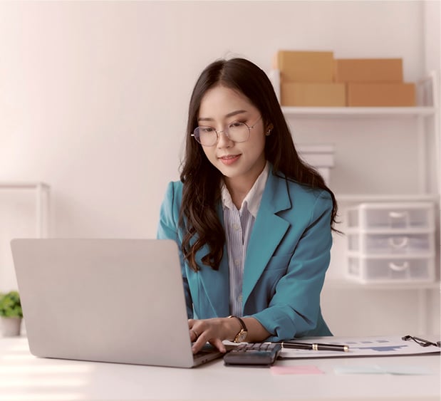 Open CVs and Open FGRs - smiling businesswoman using laptop