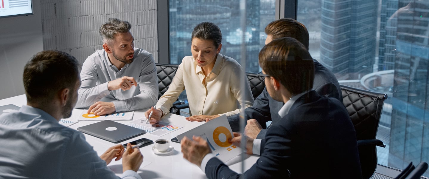 corporate businesswoman communicating with team