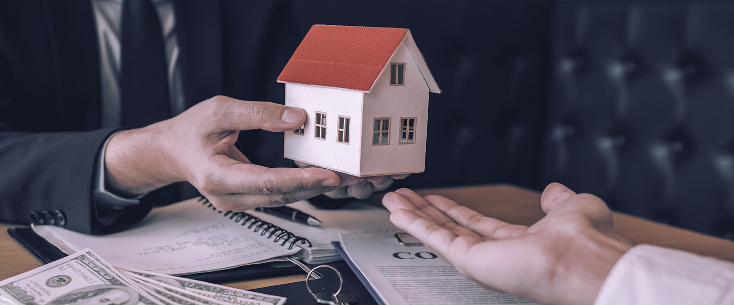 House on top of papers