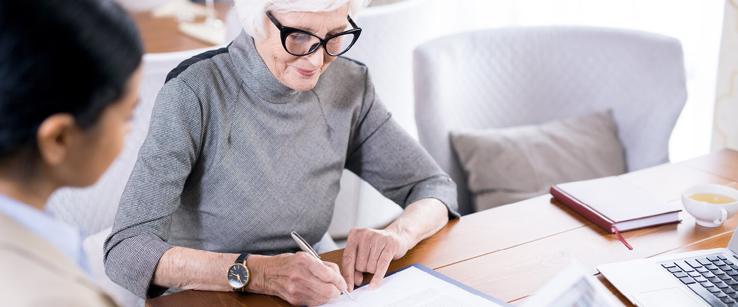 senior woman writing testament