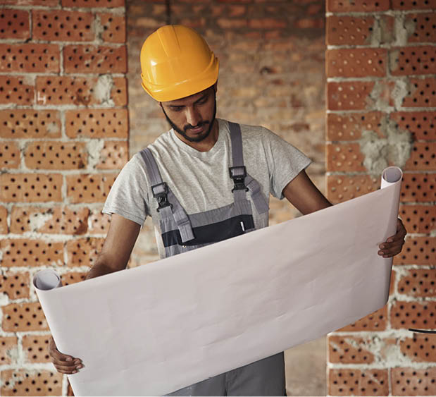 builder with big paper