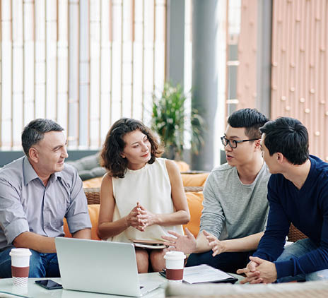 business people listening to colleague