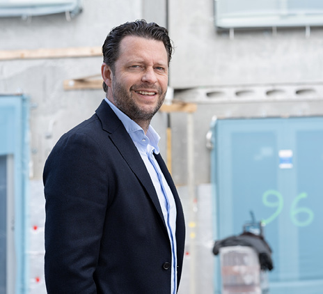 Man in front of construction site