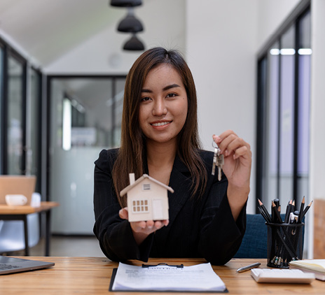 real estate agent handing over keys 